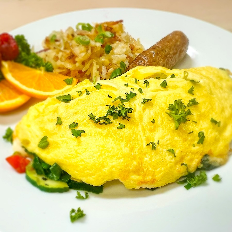 Garden vegetable omelette, chicken sausage and hash browns