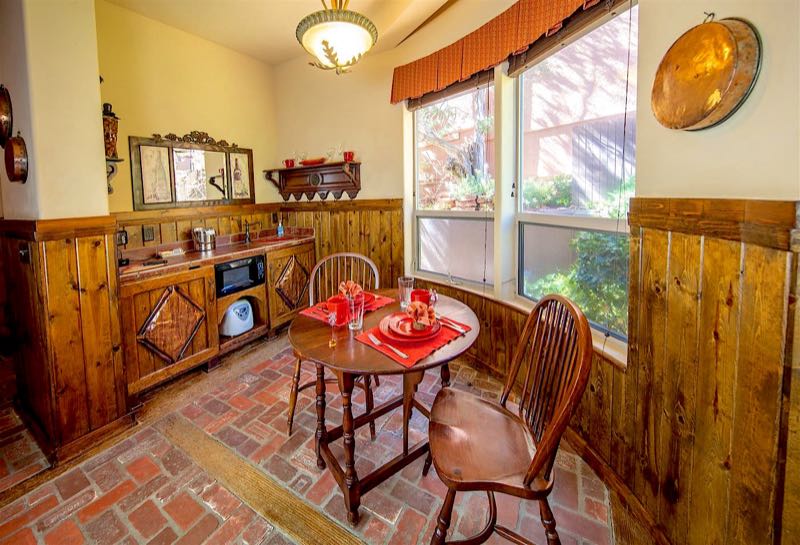 Red Cinder villa kitchenette and dining table by the windows