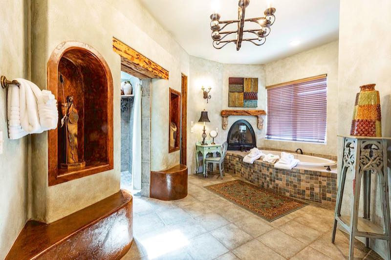 Sagebrush villa jetted tub with a fireplace