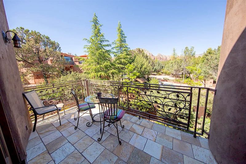 Twin Kyody villa balcony with red rock and pine views